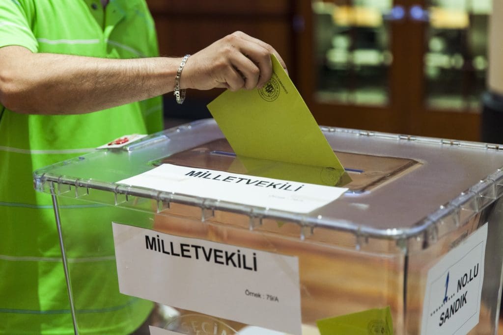 WASHINGTON, USA - MAY 27: A Turkish citizen casts his vote in the upcoming general elections, at the Turkish Embassy in Washington, USA on May 27, 2015. The general elections will be held on 7th of June 2015 in Turkey. (Samuel Corum - Anadolu Agency)